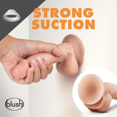 Hand pressing Dr. Spin suction-cup base firmly onto smooth wall surface, demonstrating strong hold