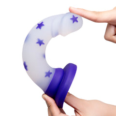 Hands demonstrating flexible soft silicone material of the Starfloat Bliss Dildo by bending shaft