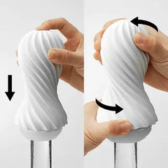 Hands demonstrating squeeze and twist motions on the white inner sleeve