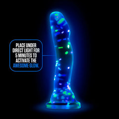 Hanky Panky Confetti dildo glowing blue in the dark after light activation