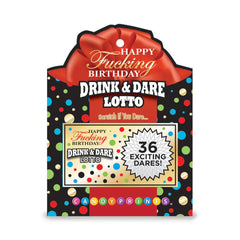 Close-up of Happy Fucking Birthday Lotto packaging with gold-bordered sample ticket and bold typography
