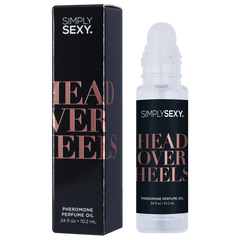 Close-up of Head Over Heels roll-on applicator ball tip with black box packaging behind it