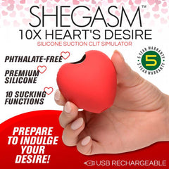 Heart's Desire suction clit stimulator held in hand showing scale, with key feature callouts on packaging graphic