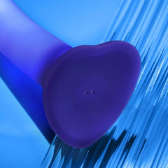 Heart-shaped suction base with magnetic charging contacts and safety certification marks