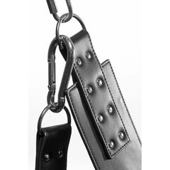 Close-up of heavy-duty carabiner clip attached to riveted leather strap on the Extreme Sling