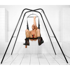 Heavy-duty A-frame swing stand supporting a leather sling harness with stirrups, side angle