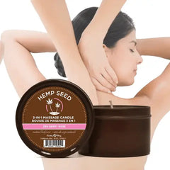 Hemp Seed Massage Candle Zen Berry Rose tin displayed beside a person receiving a back massage