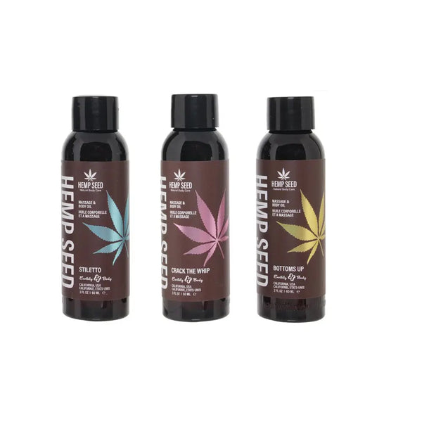 Hemp Seed Stiletto, Crack the Whip, and Bottoms Up massage oils standing upright, front labels visible