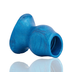 Hollow open channel of Oxballs Pighole Morph-5 visible from rear angle, blue platinum silicone