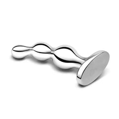 Horizontal lay-flat angle of chrome anal beads showcasing flat oval base and bead texture