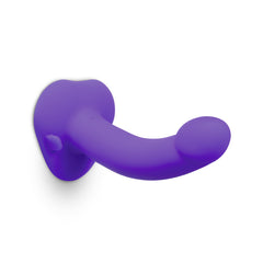 Horizontal side angle of purple curved dildo attached to suction base showing full curved shape