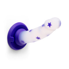 Horizontal view of Together Starfloat Bliss Dildo mounted on its purple suction cup base