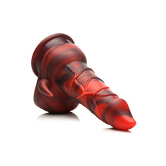 Horny Devil demon dildo angled low showing tapered tip and red-black marbled silicone texture