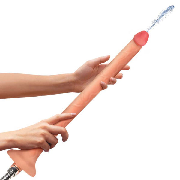 Hosed 12-inch slim silicone enema hose held by two hands, water flowing from tip