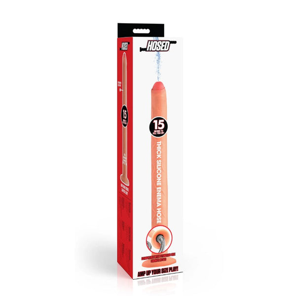 Hosed 15-inch thick silicone enema hose displayed beside its retail packaging box