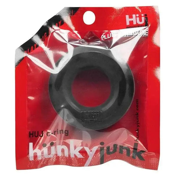 Hunkyjunk HUJ Cock Ring in black silicone shown in retail packaging on red card