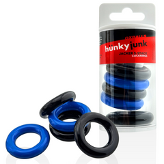 Hunkyjunk Jacker cockrings beside retail packaging, displaying mixed blue and black color set