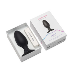 Hush 2 butt plug beside open gift-style box with charging accessory included