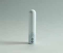 Illumination The Bullet Vibrator in matte white finish standing upright, showing wave grip and control buttons