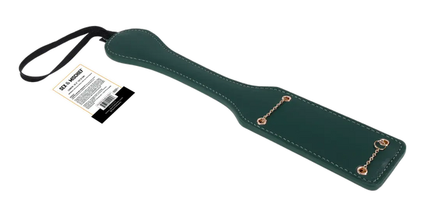 Indica Chain Impressions Paddle displayed with product label showing back panel and wrist loop strap