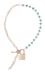 Indica Crystal Day Collar laid flat showing teal crystal beads and gold chain with padlock pendant