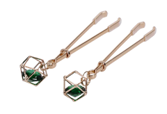 Close-up of Indica Crystal Nipple Clips showing adjustable tension mechanism and gem cage