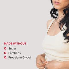 Infographic stating lubricant is made without sugar, parabens, or propylene glycol beside a woman in white