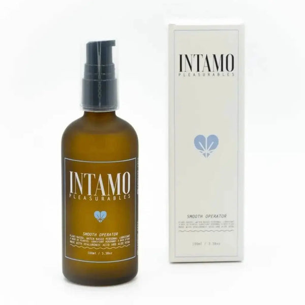 Intamo Smooth Operator lubricant in amber glass pump bottle beside white box