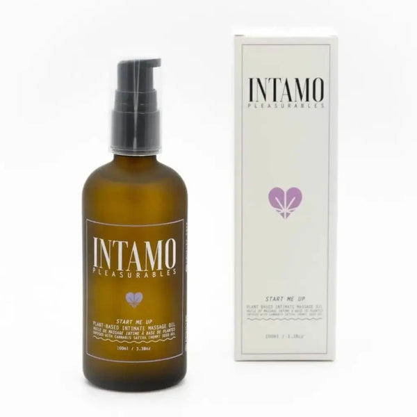 Intamo Start Me Up plant-based intimate massage oil in amber pump bottle with white box