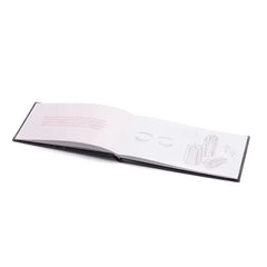 Interior pages of Le Wand crystal pleasure tools guide book with illustrated crystal artwork