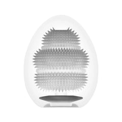 Interior view of Tenga Egg Misty II showing dense spike-covered elastomer sleeve inside white casing