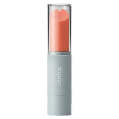 Iroha stick vibrator in coral silicone tip with pale gray base, cap on, upright view