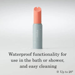 Iroha stick vibrator standing in water droplets, illustrating waterproof design up to 20 inches