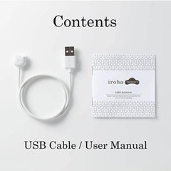 Iroha Temari box contents laid flat: white USB charging cable with magnetic tip and printed user manual booklet