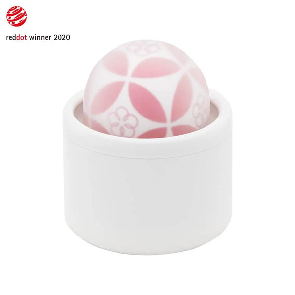 Iroha Temari HANA vibrator in white holder with pink floral patterned silicone dome, Red Dot 2020 winner