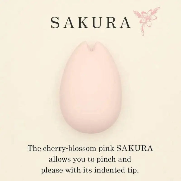 Iroha Sakura clitoral vibrator in cherry-blossom pink with soft indented tip, front view