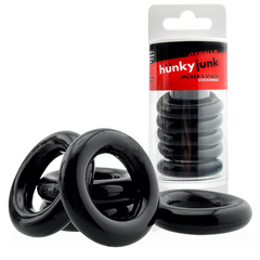 Jacker 5-Stack black cockrings beside original Hunkyjunk packaging, showing set count