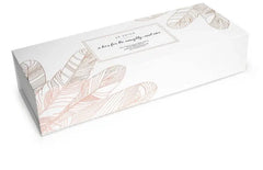 Je Joue gift set closed white box with rose gold botanical leaf print and script text on lid
