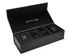 Je Joue Naughty Gift Set open box showing vibrator, candle, cards, and silk accessories