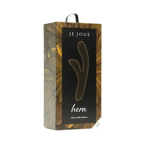 Je Joue Hera rabbit vibrator in dark packaging with gold feather design and product silhouette