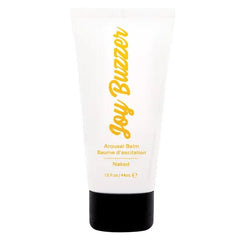 Joy Buzzer Arousal Balm Naked in white squeeze tube with yellow script logo and black cap