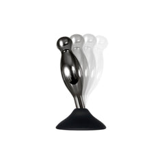 Close-up of Joy Sticks plug with motion blur illustrating flexible movement on silicone suction base