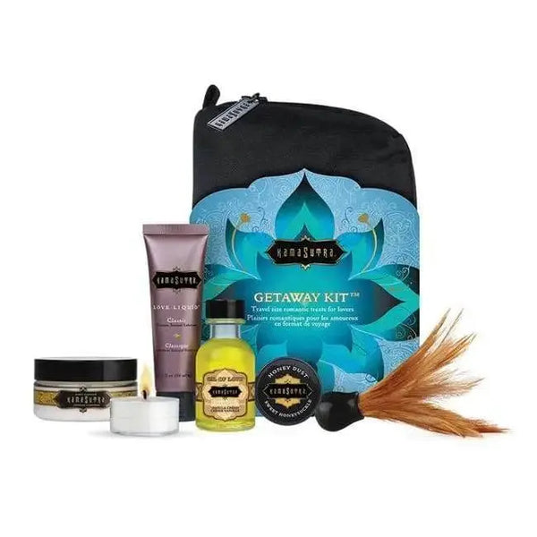 Kama Sutra Getaway Kit displayed with travel bag, candle, oil, cream, and feather duster