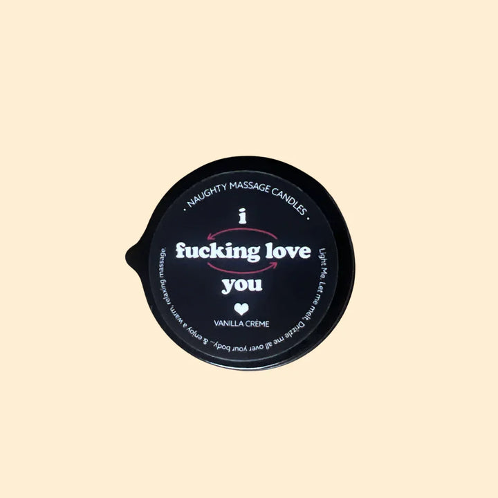 Kama Sutra I F*cking Love You massage candle, black tin lid with white script, vanilla crème scent