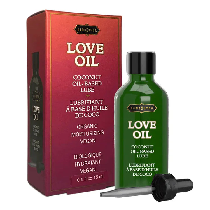 Kama Sutra Love Oil in a dark green glass dropper bottle beside its red box
