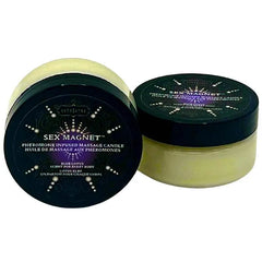 Kama Sutra Sex Magnet Blue Lotus massage candle in two round dark-lidded jars showing pale yellow wax