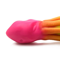 Close-up of King Kraken dildo tip detail showing smooth pink silicone squid-head form