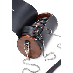 Close-up of Kinky Clutch cylindrical carry case interior revealing red-stitched leather cuffs and D-rings
