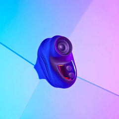 Kisscool finger stimulator with circular tapping tip and dual control buttons under neon lighting