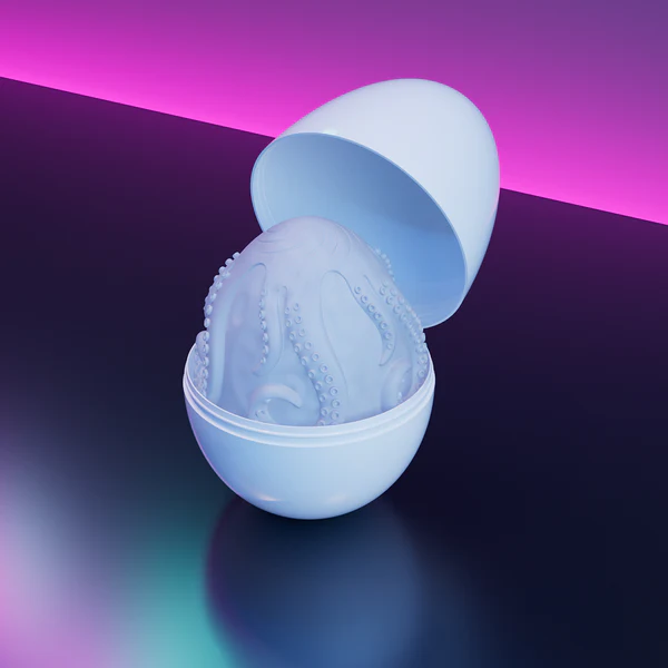 Kraken silicone sleeve with tentacle texture resting in open white egg case, neon backdrop